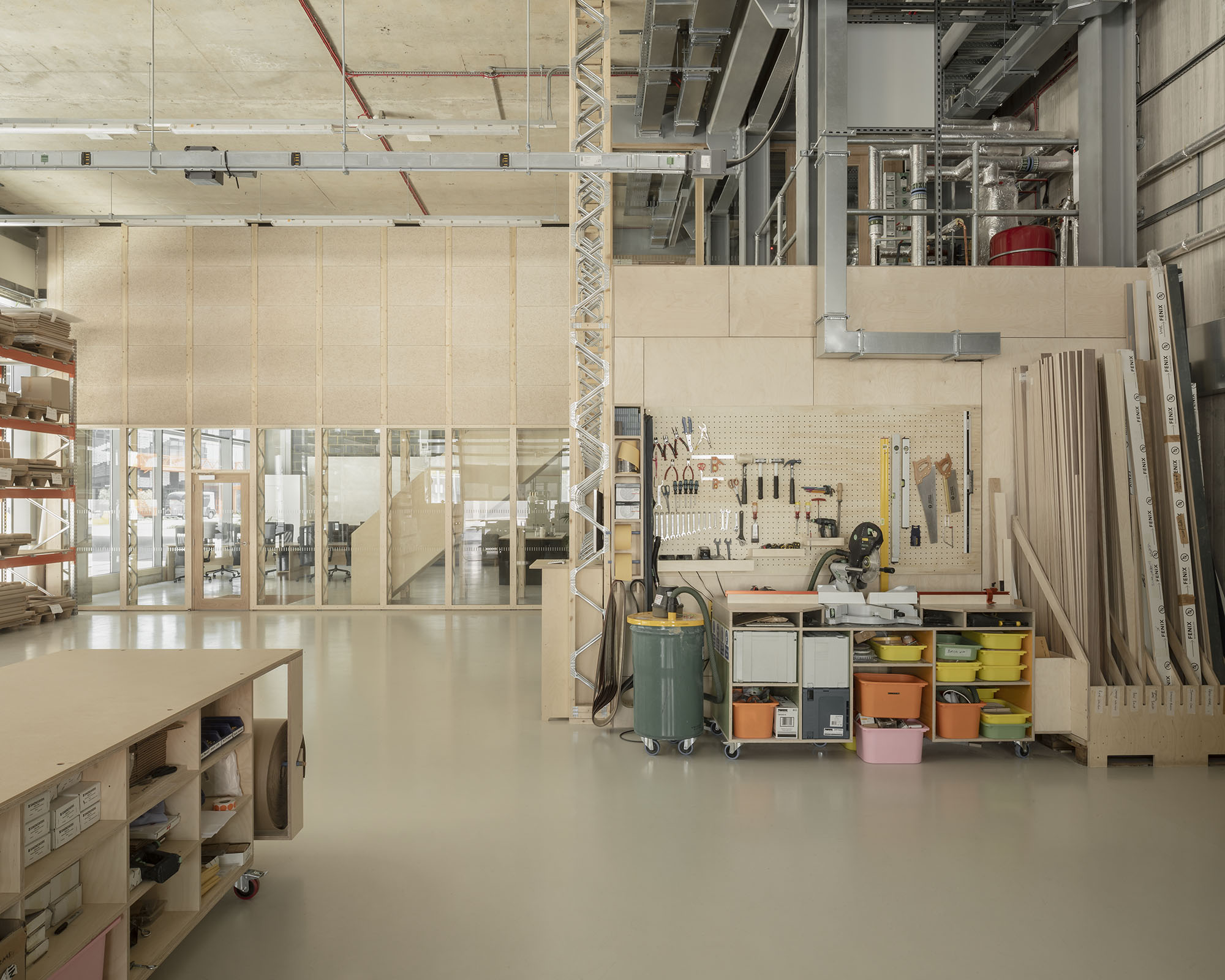 Erbar Mattes Architects Here East Stratford Hackney Plykea workshop showroom office refurbishment retrofit interior fit out timber studwork open web joists wood wool boards